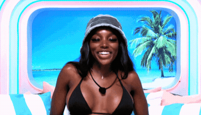 Woman In Bikini And Hat Smiling GIF