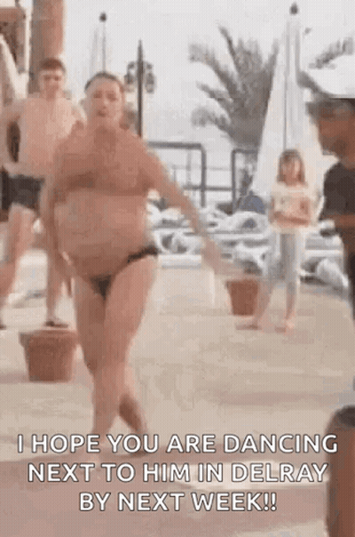 Woman In Bikini Dancing Next To Man In Delray Beach GIF