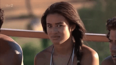Woman In Bikini Poses For Camera With Two Men GIF