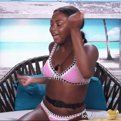 Woman In Bikini Sitting In Chair Love Island GIF