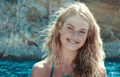 Woman In Bikini Smiling With Necklace GIF