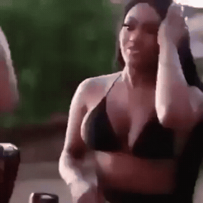 Woman In Bikini Talking To Man GIF