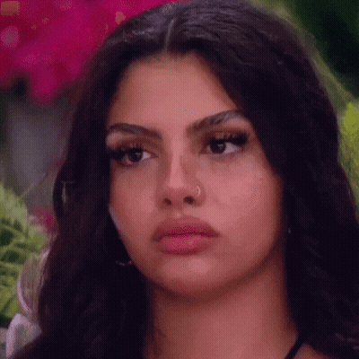 Woman In Bikini Top And Black Necklace Funny Face GIF