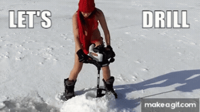 Woman In Bikini Using Drill On Snow GIF