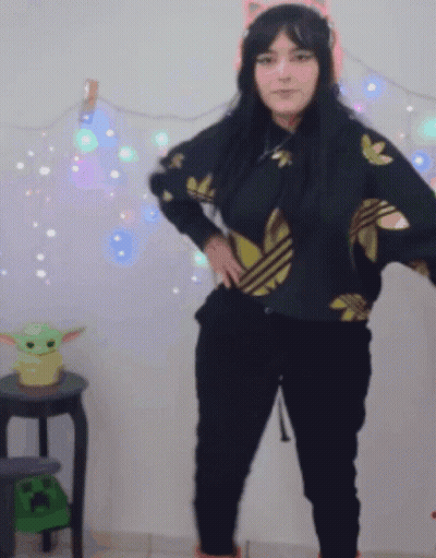 Woman In Black Adidas Near Green Baby Yoda GIF