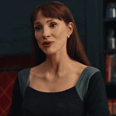 Woman In Black And Grey Top With ZX Logo GIF