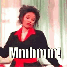 Woman In Black And Red Dress Saying Mmmm GIF