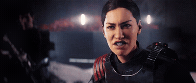Woman In Black And Red Military Uniform Looks Angry GIF