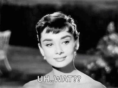 Woman In Black And White Dress Saying Uh Wat GIF