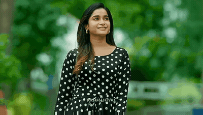 Woman In Black And White Polka Dot Dress GIF