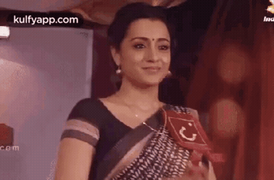 Woman In Black And White Saree Holding Red Sign GIF