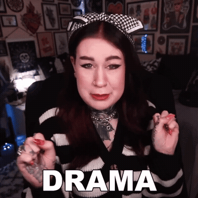Woman In Black And White Striped Sweater With Drama GIF