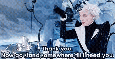 Woman In Black And White Suit Holding Wine Saying Thank You GIF