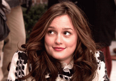 Woman In Black And White Sweater Close Up GIF