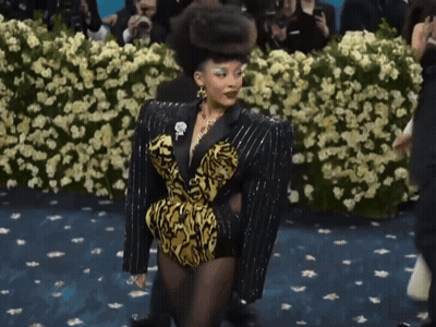 Woman In Black And Yellow Outfit GIF