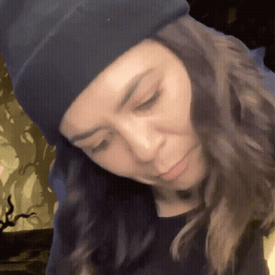 Woman In Black Beanie And Shirt GIF