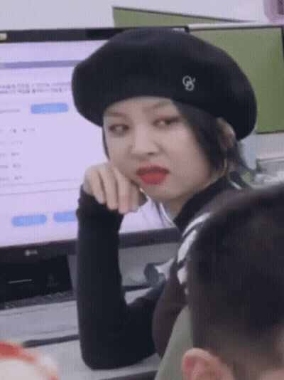 Woman In Black Beret With Letter G In Front Of LG Computer GIF