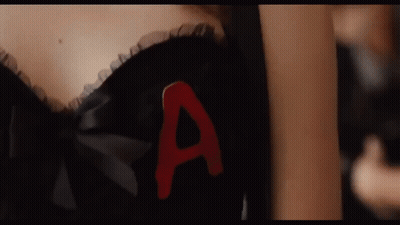 Woman In Black Bra With Red Letter A GIF