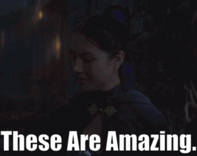 Woman In Black Cape Saying These Are Amazing GIF