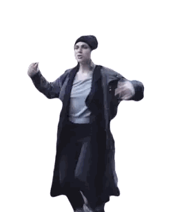 Woman In Black Coat And Hat Dancing Sticker