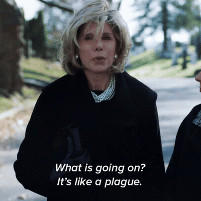Woman In Black Coat Says What Is Going On GIF