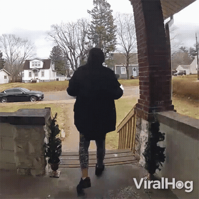 Woman In Black Coat Walking Down Porch Viralhog GIF