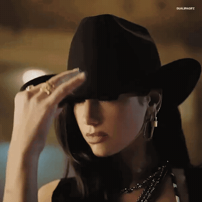 Woman In Black Cowboy Hat Covering Face GIF