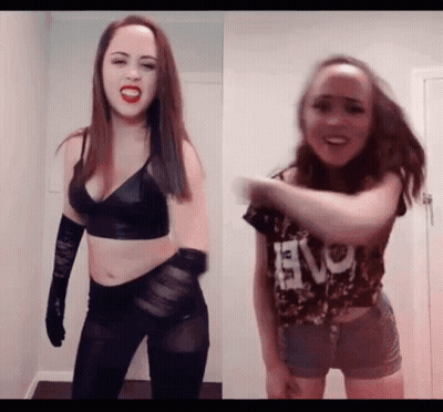 Woman In Black Crop Top And Gloves Dancing GIF