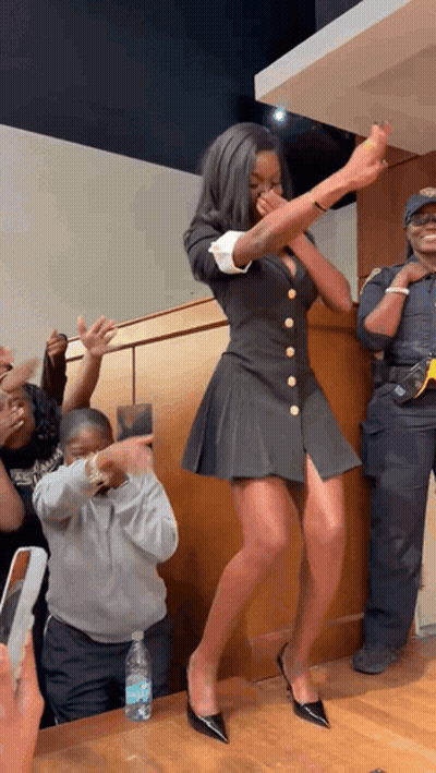 Woman In Black Dress And Heels Dancing GIF