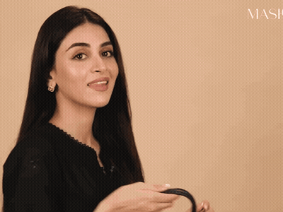 Woman In Black Dress And Purse By Mask Sign GIF
