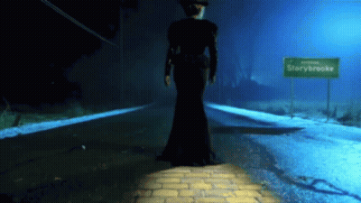 Woman In Black Dress At Starybrooke Sign GIF