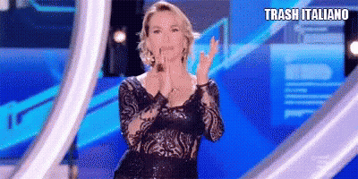 Woman In Black Dress Clapping On Stage GIF