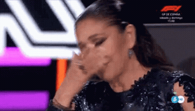 Woman In Black Dress Covering Face And Crying GIF