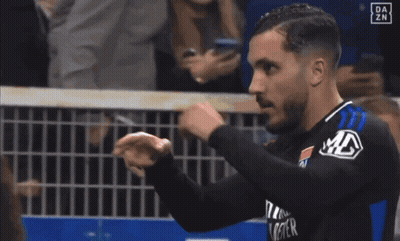 Woman In Black Dress Dancing In Stadium GIF