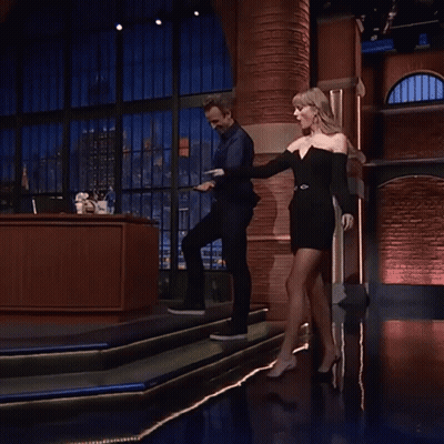 Woman In Black Dress Dancing With Man GIF