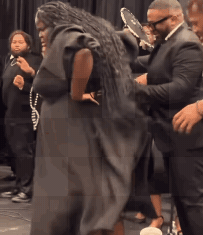 Woman In Black Dress Dancing With Man In White Shirt GIF