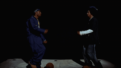 Woman In Black Dress Fist Bump Crowd GIF