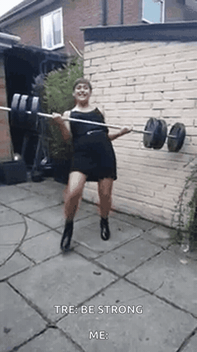 Woman In Black Dress Holding Barbell GIF
