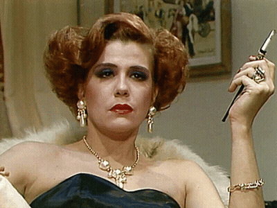 Woman In Black Dress Holding Cigarette GIF
