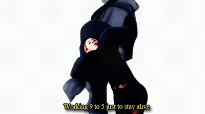 Woman In Black Dress Holding Cloth Over Head Saying Working 9 To 5 Just To Stay Alive GIF