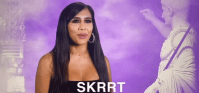 Woman In Black Dress In Front Of Statue Skrrt GIF
