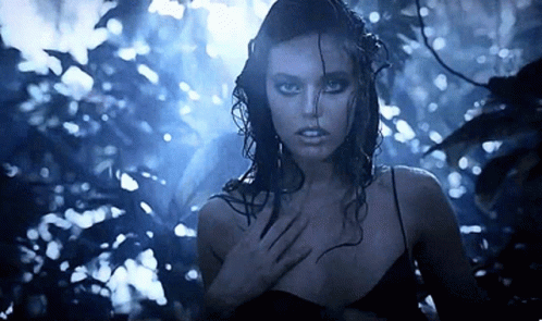 Woman In Black Dress In Woods GIF