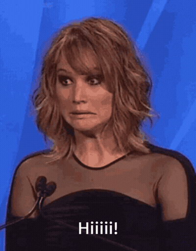 Woman In Black Dress Making Funny Face GIF