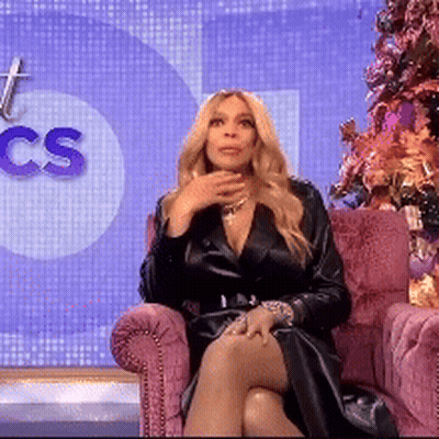 Woman In Black Dress On Pink Chair CS Sign GIF