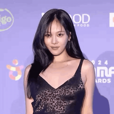 Woman In Black Dress On Purple Carpet GIF