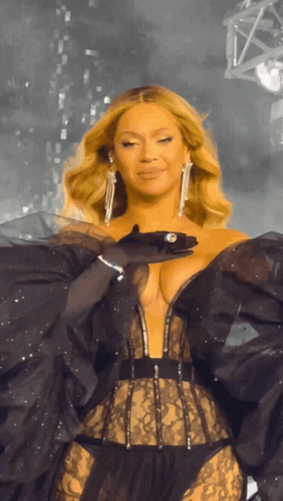 Woman In Black Dress On Stage GIF