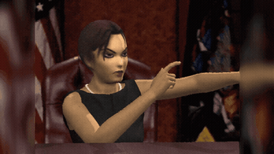 Woman In Black Dress Pointing At Table GIF