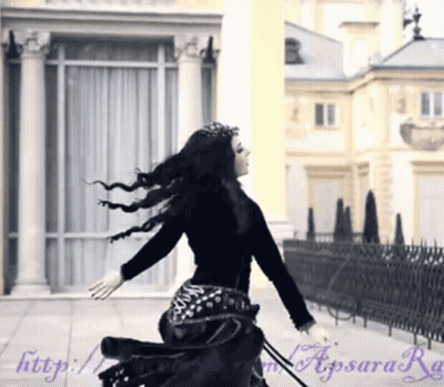 Woman In Black Dress Running In Front Of Building Http://apsara.ru GIF