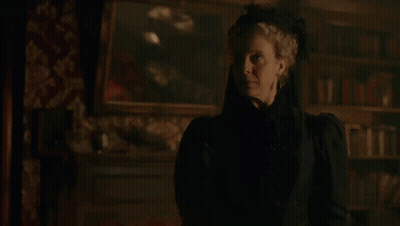 Woman In Black Dress Saying Get Out GIF