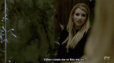 Woman In Black Dress Says Either Crown Me Or Kiss My Ass GIF